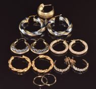 Six pairs of 9ct gold earrings (10.2g) and a pair of silver gilt earrings