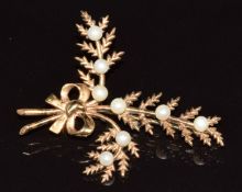 A 9ct gold brooch in the form of a fern set with pearls, 4.9g, 4 x 3.5cm