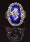 An early 18ct gold Victorian ring set with blue enamel and a border of rose cut diamonds, 5.9g, size