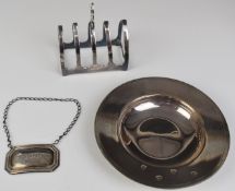 Hallmarked silver items comprising modern feature hallmarked dish, toast rack and a Sherry bottle