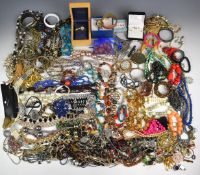 A collection of costume jewellery including beads, brooches, bracelets, vintage and mother of