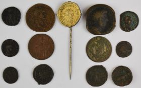 Thirteen mainly Roman coins, together with paper packets including examples labelled Constantine