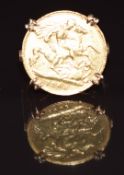 A 9ct gold ring set with a 1903 gold half sovereign, 8.6g, size Q