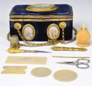 A 19thC blue velvet etui case set with miniature paintings of Paris, with four mother of pearl