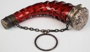 Silver mounted red cranberry glass trumpet shaped scent bottle on chain, no visible marks, length