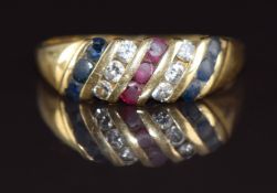 An 18ct gold ring set with rubies, sapphires and diamonds, 3.6g, size P