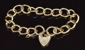 A 9ct gold curb link bracelet with heart padlock clasp, 25.4g, 16cm long
