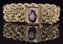 Victorian 14k gold bracelet set with a garnet cabochon and diamonds, 51.5g, 18cm long