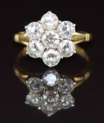 An 18ct gold ring set with a cluster of seven diamonds, each approximately 0.3ct, 4.6g, size O
