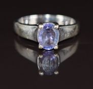 A 14k white gold ring set with an oval tanzanite of approximately 1ct, 4.5g, size L