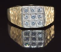 A 9ct gold ring set with cubic zirconia, 3.2g, size T