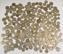 Approximately 1370g pre-1947 silver coinage, mostly 1920s, together with two American dimes and