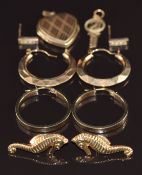Four pairs of 9ct gold earrings (4.6g), 9ct gold back & front heart locket and a 9ct gold charm (0.