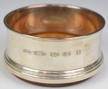 Elizabeth II feature hallmarked silver wine bottle coaster, Birmingham 2012, maker W I Broadway &