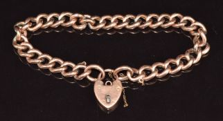 A 9ct rose gold curb link bracelet with heart padlock clasp, 12.6g, 19cm long