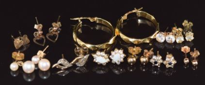A pair of 18ct gold hoop earrings (2g), and ten pairs of 9ct gold earrings set with pearls, opals,