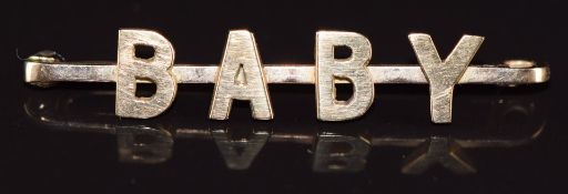 A 15ct gold 'Baby' brooch, 2.5g, 3.8cm