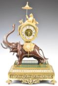 19thC French figural mantel clock formed as a man atop an elephant, the two train movement