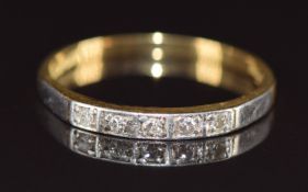 An 18ct gold ring set with diamonds in a platinum setting, 2.2g, size P