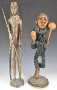 African tribal figures including intricately carved figure with knobkerrie, tallest 67cm