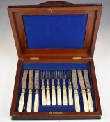 Set of mother of pearl handled knives and forks in fitted mahogany case, width 29.5cm