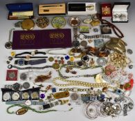 A collection of costume jewellery including pressed amber necklace, silver Albert, silver chains,