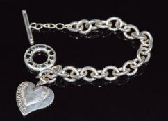 A silver bracelet marked Tiffany & Co, 20cm long