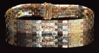 A 9ct gold tri-coloured bracelet, 30.3g, 18cm long