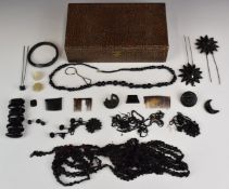 A collection of Whitby jet and French jet including bracelet, necklace, hair pins and two