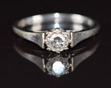 An 18ct white gold set with a round cut diamond of approximately 0.22ct, 3.4g, size O