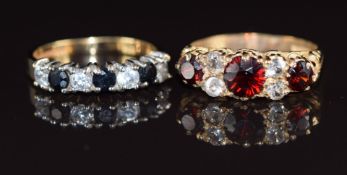 Two 9ct gold rings, one set with garnets and spinel (size K) and the other sapphires and cubic