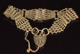A 9ct gold gate bracelet with heart padlock clasp, 24.6g 18cm long