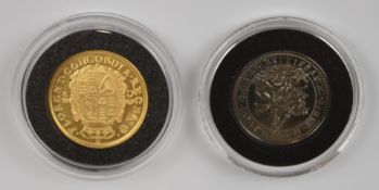 Charles I restrike 22ct gold five unite coin, 4g, together with a similar silver example, with