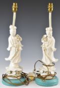Pair of Chinese blanc de chine figural lamps, height 50cm