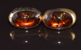 Willy Jagert for Halberstadt 14k gold earrings each set with pressed amber cabochon, 8.3g