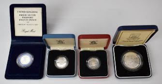Four Royal Mint etc silver proof coins to include Falklands liberation, piedfort silver 20p and