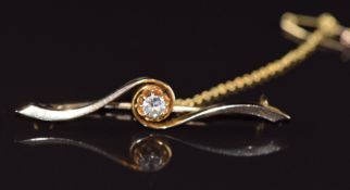 A 9ct gold brooch set with a diamond in a twist setting, 3g, 4cm long