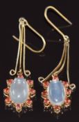 A pair of silver gilt earrings set with moonstones, 3.5cm