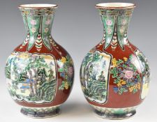 A pair of Chinese vases decorated with scenes of figures on horses on maroon ground, with mark to