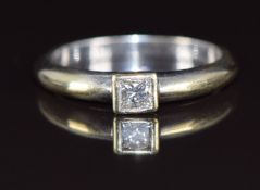 A 9ct white gold ring set with a princess cut diamond of approximately 0.15ct, 2.7g, size K