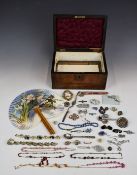 A collection of costume jewellery including Miracle brooch, Exquisite necklace, silver brooch set