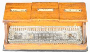 Haberdashery / shop fitting interest oak triple inkwell, width 27cm