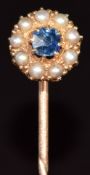 Victorian stick pin set with a round cut sapphire surrounded by seed pearls, 2.1g, 6cm