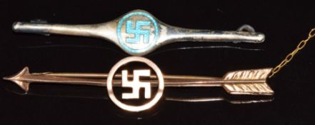 A 9ct gold swastika brooch (1g) and a silver brooch set with blue enamel in the form of a swastika