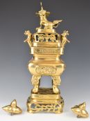 Chinese bronze incense burner on stand, both with pierced decoration, height 54cm