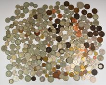 Approximately 1365g of UK silver coinage pre-1947, together with a quantity of mixed UK and overseas