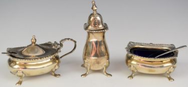 George V hallmarked silver three piece cruet set, London 1911, maker Reid & Sons Ltd, height of