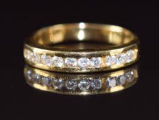 An 18ct gold half eternity ring set with ten diamonds, each approximately 0.04ct, 4.2g, size P
