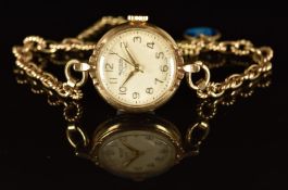 Rotary 9ct gold ladies wristwatch with gold hands and Arabic numerals, cream dial and signed 17