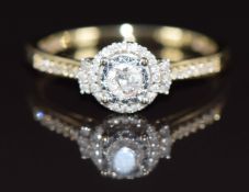 A 9ct gold ring set with a diamond of approximately 0.15ct surrounded by further diamonds, 2.8g,